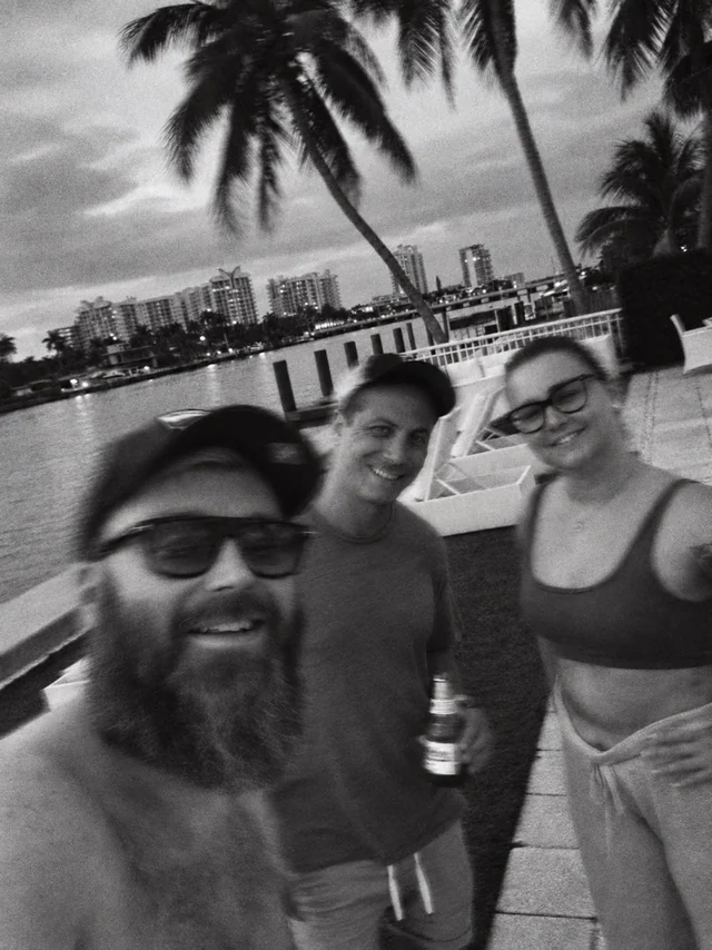 Robin, Dom, and Jon together by the waterfront