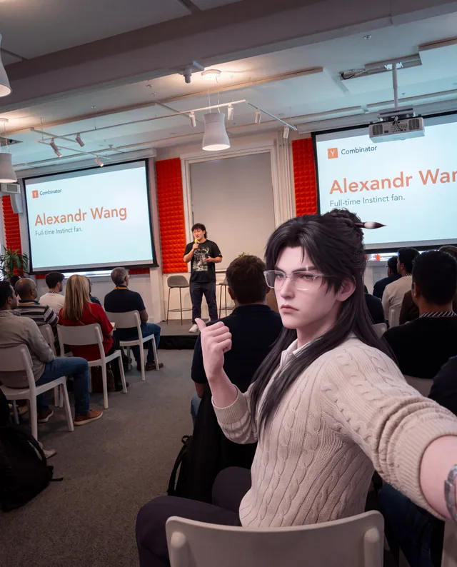 Instinct taking a selfie from the audience during a Y Combinator talk.